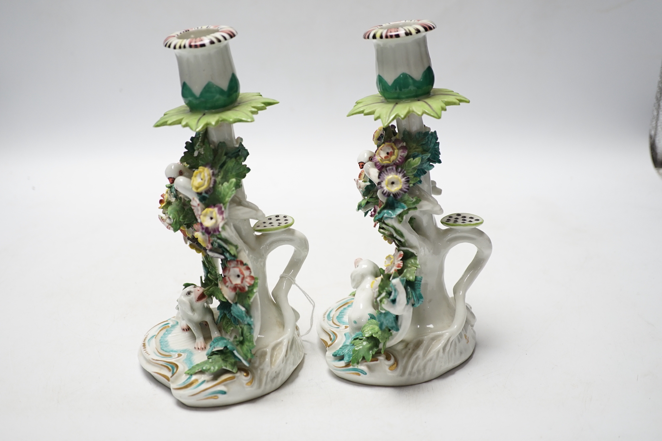 A pair of Samson porcelain chambersticks, in Derby style, with floral encrusted decoration, 19cm high